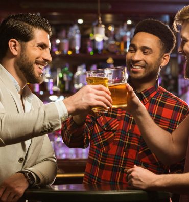 happy-smiling-male-friends-clinking-with-beer-mugs-scaled happy-smiling-male-friends-clinking-with-beer-mugs-scaled